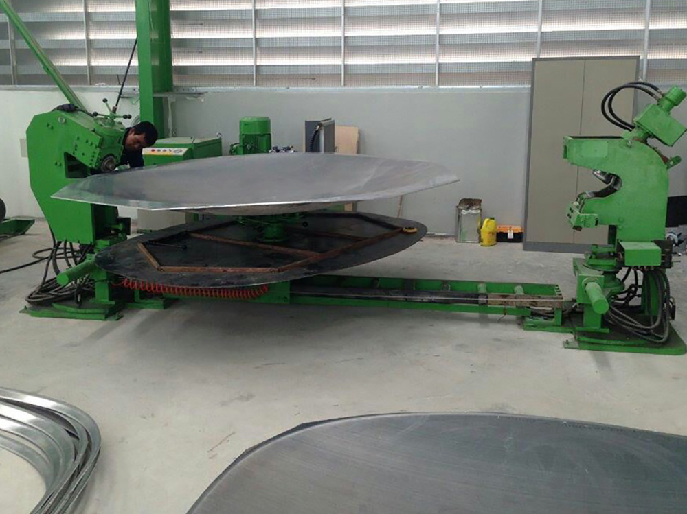 dish end flanging machine